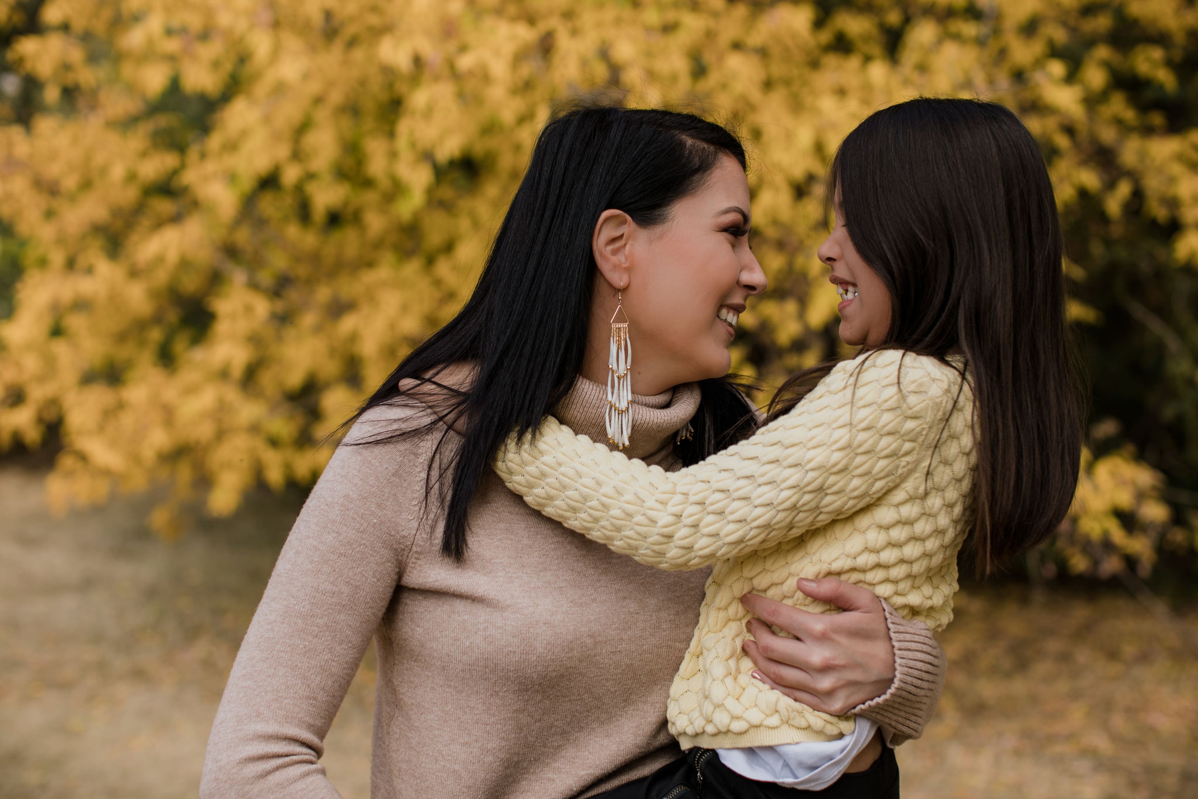 Happy woman and child smiling together – promoting everyday comfort and support through Lumoria’s wellness-inspired solutions