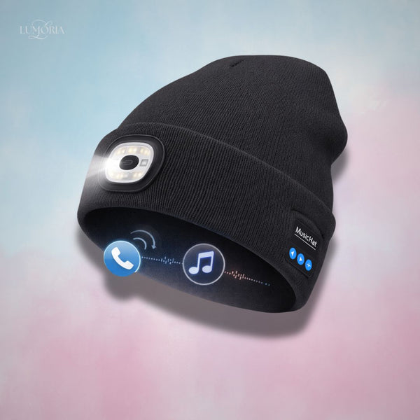 Black beanie with a built-in device on a gradient background