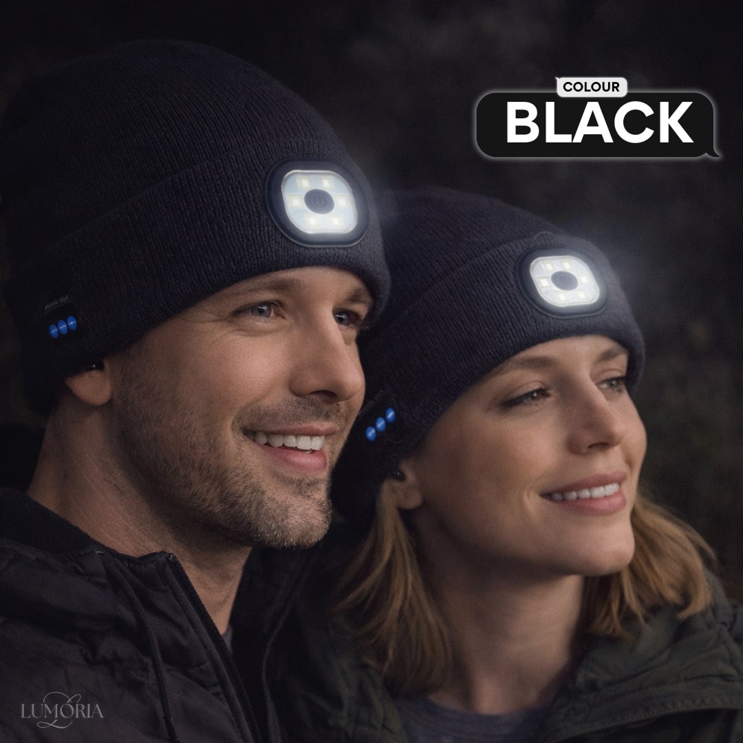 Man and woman wearing the GlowSound Beanie™ in black with Bluetooth audio and front LED light for outdoor use